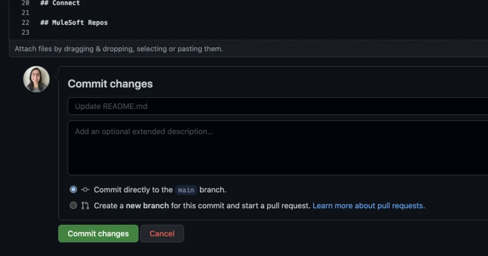 GitHub Commit changes form with the default Update README.md message and green Commit button