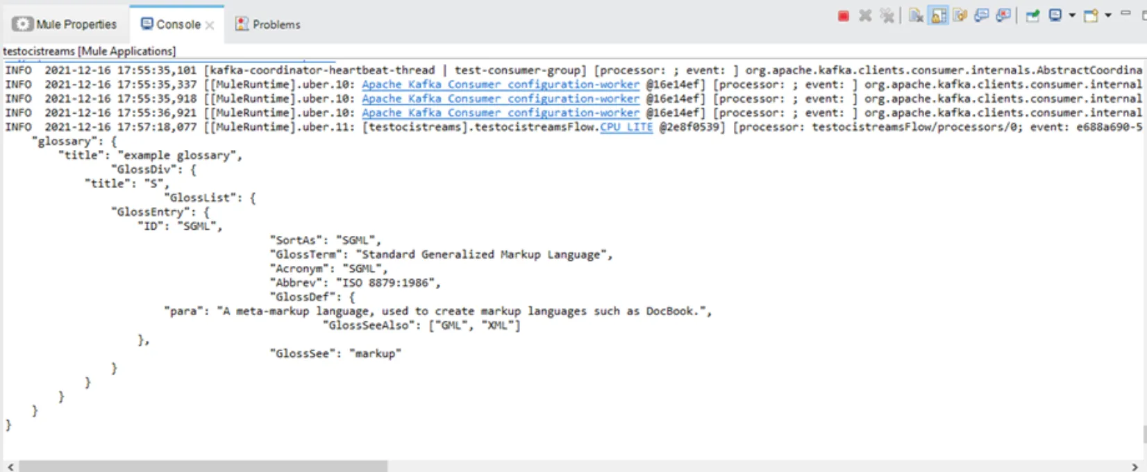 Anypoint Studio console logging the JSON glossary message consumed from the stream